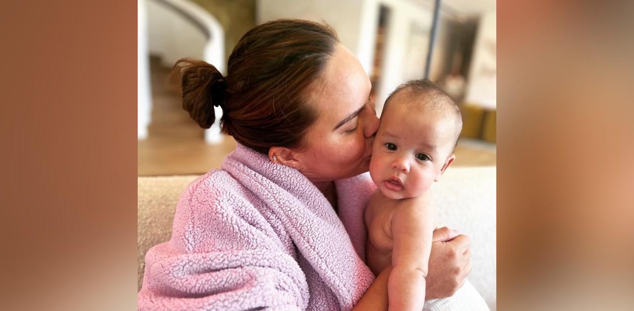 chrissy teigen photo  month old daughter esti yawning