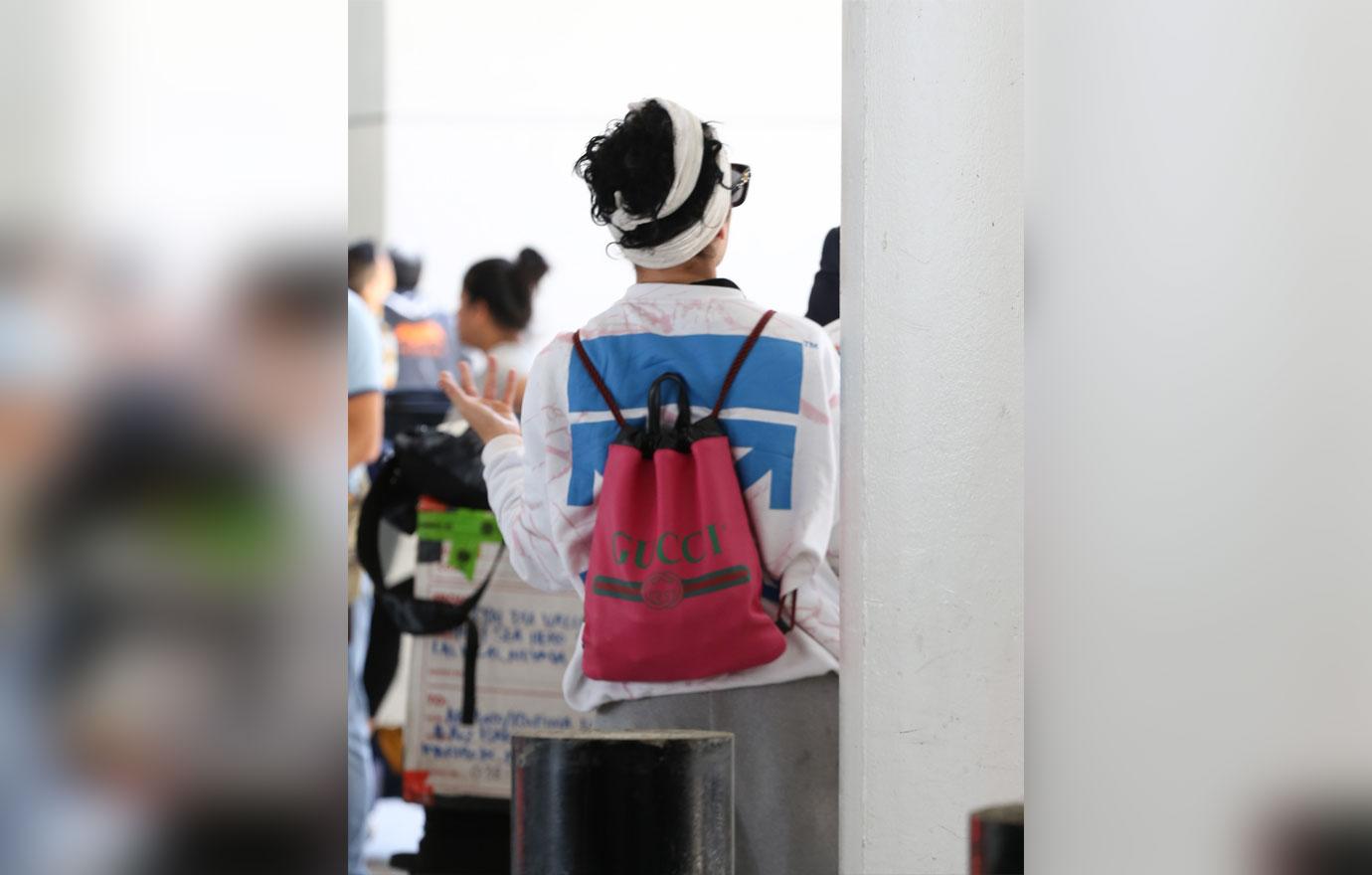 Halsey at airport with natural hair