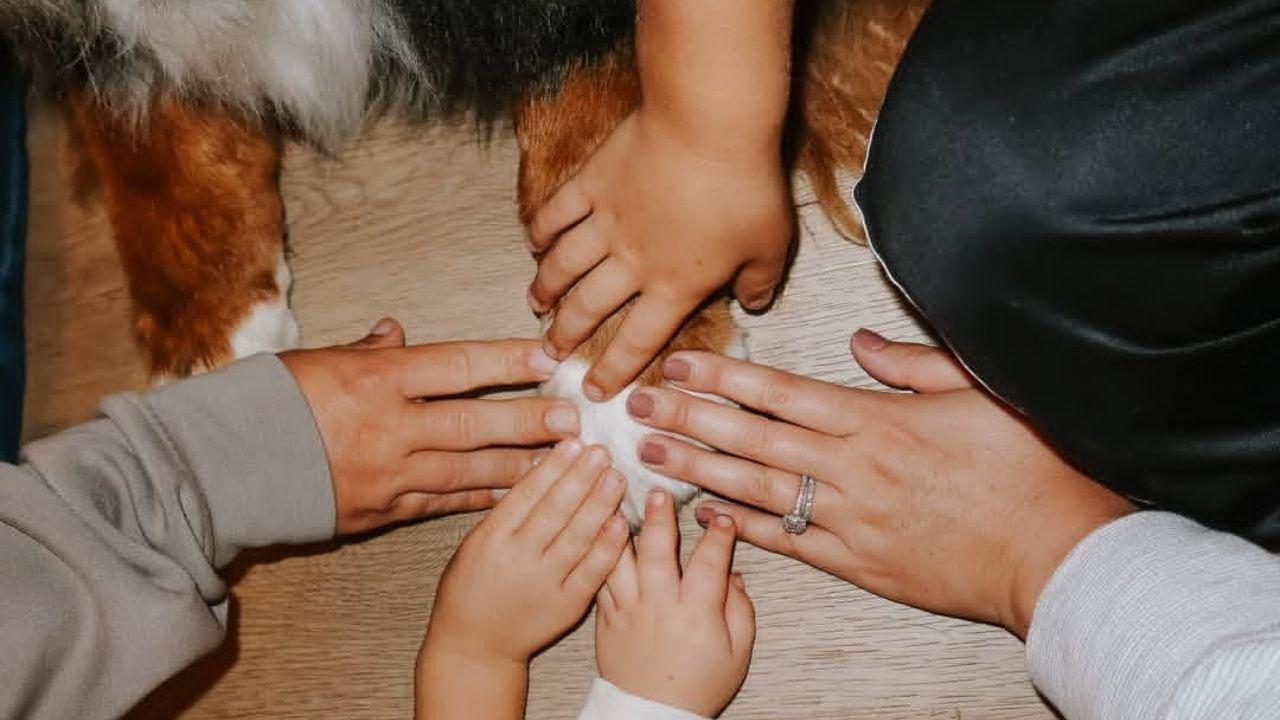 Image of Tori Roloff shared a photo of her entire family holding one of Murphy's paws after the dog's tragic death.