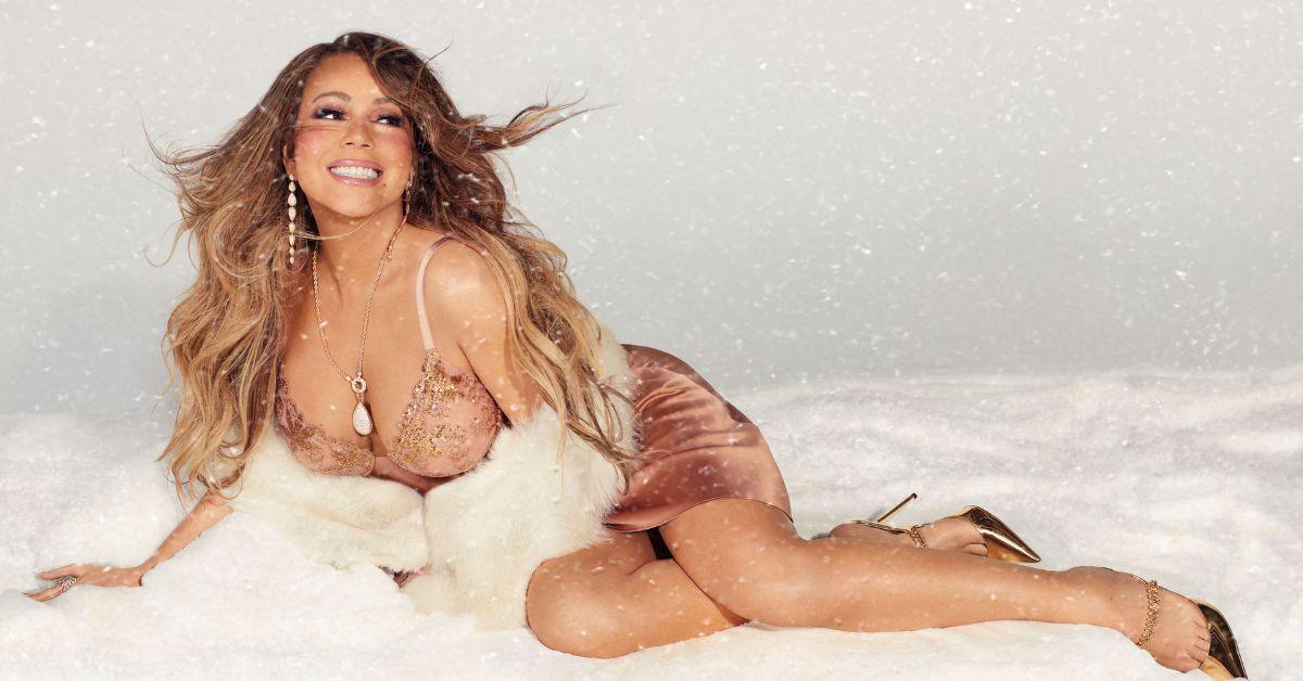 Photo of Mariah Carey was presented the award by Ariana Grande.