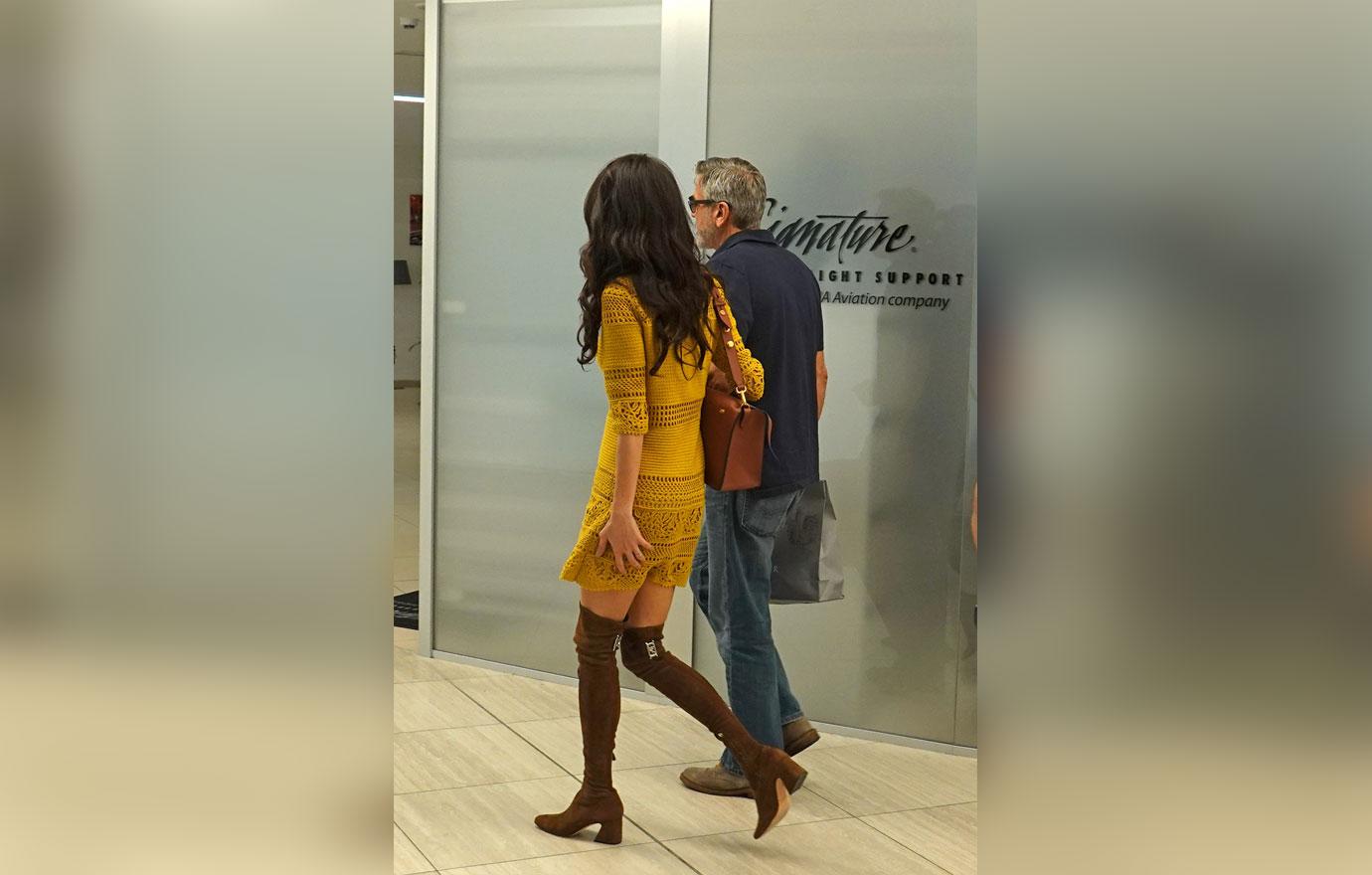 EXCLUSIVE: George Clooney and Amal Alamuddin leave from Rome Ciampino airport on a pivate flight