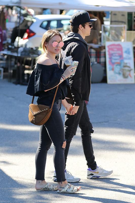 Hilary Duff can&#8217;t contain her smile while out with her new beau Matthew Koma