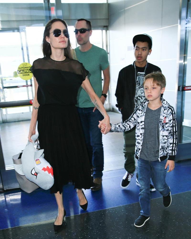 Angelina Jolie and family are seen at JFK