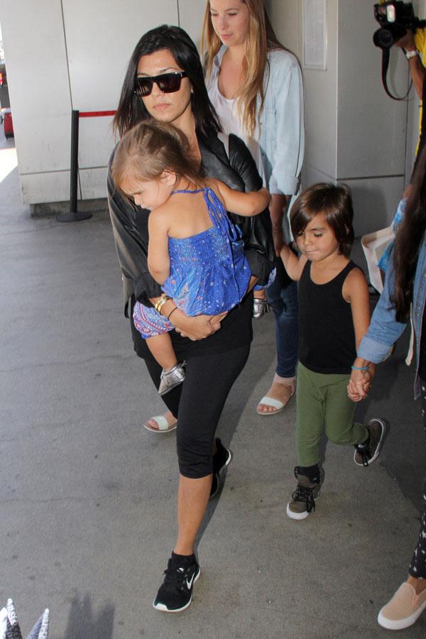 Kourtney kardashian scott disick fourth baby akm 06