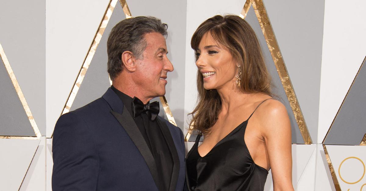 Sylvester Stallone cuddles up to his three girls during family getaway