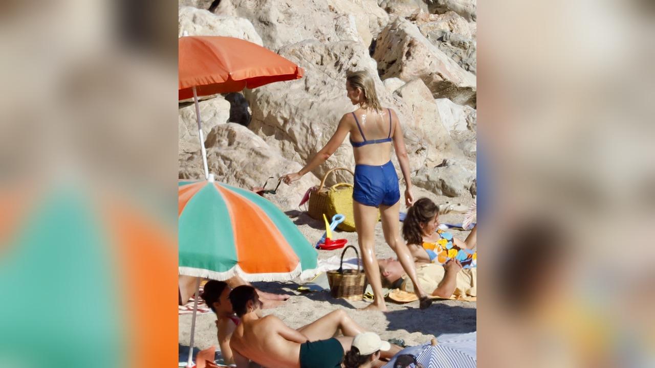 Image of Margot Robbie stood in front of the cameras as the cast and crew filmed scenes along the French Riviera.