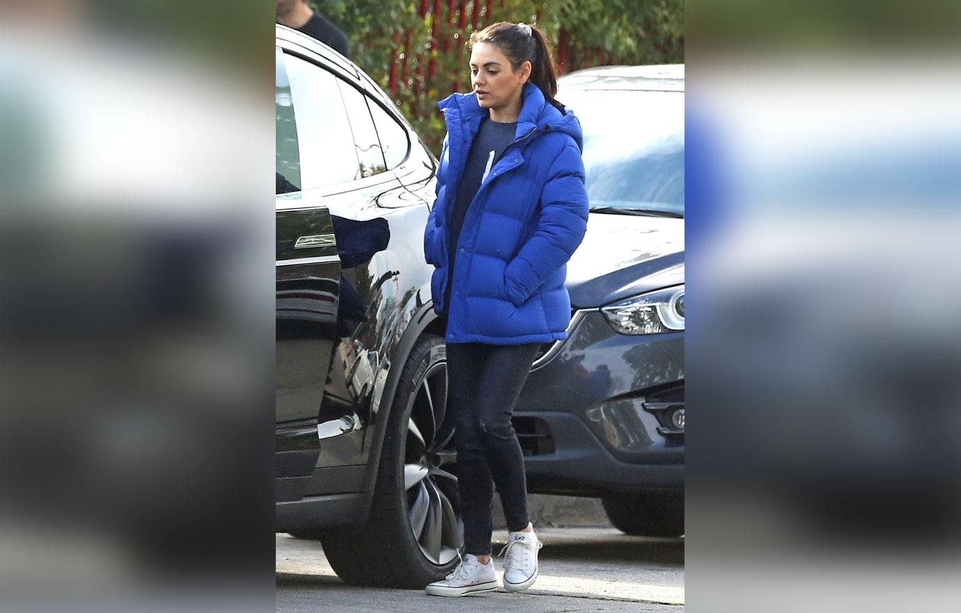 EXCLUSIVE: Mila Kunis all wrapped up for the chilly weather in LA