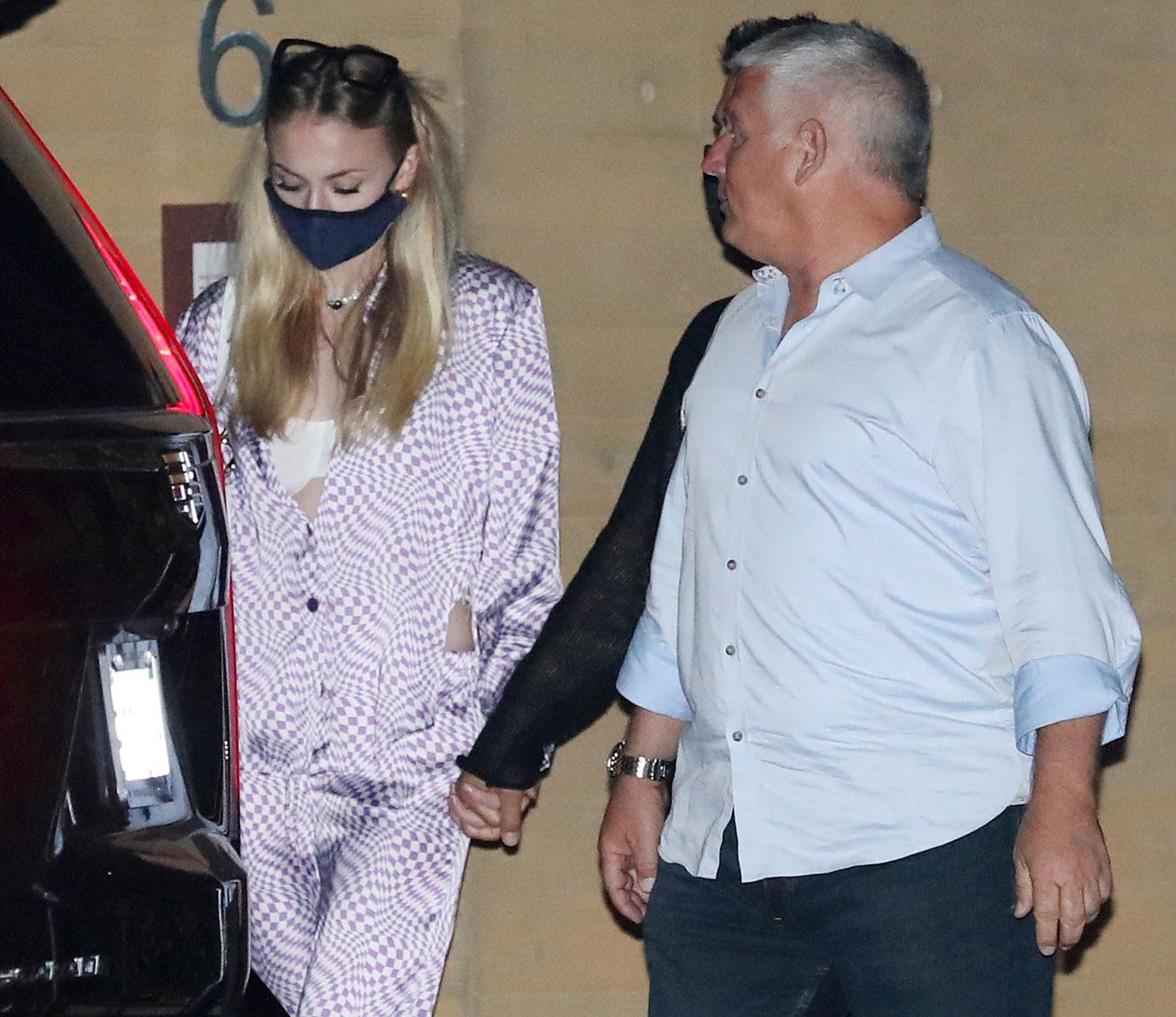 joe jonas and sophie turner walk hand in hand as they leave nobu malibu