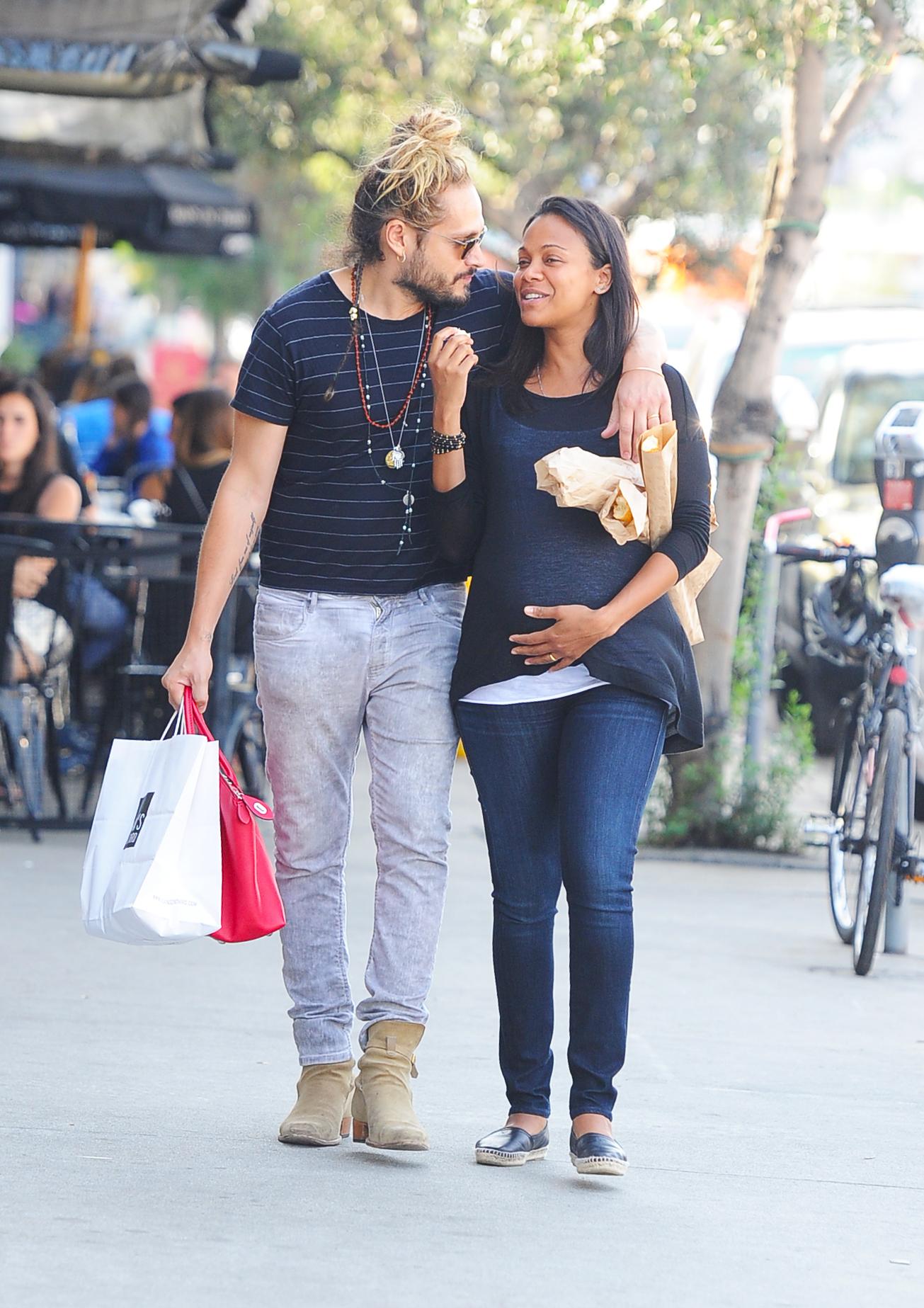 Zoe Saldana and Marco Perego show off with some PDA