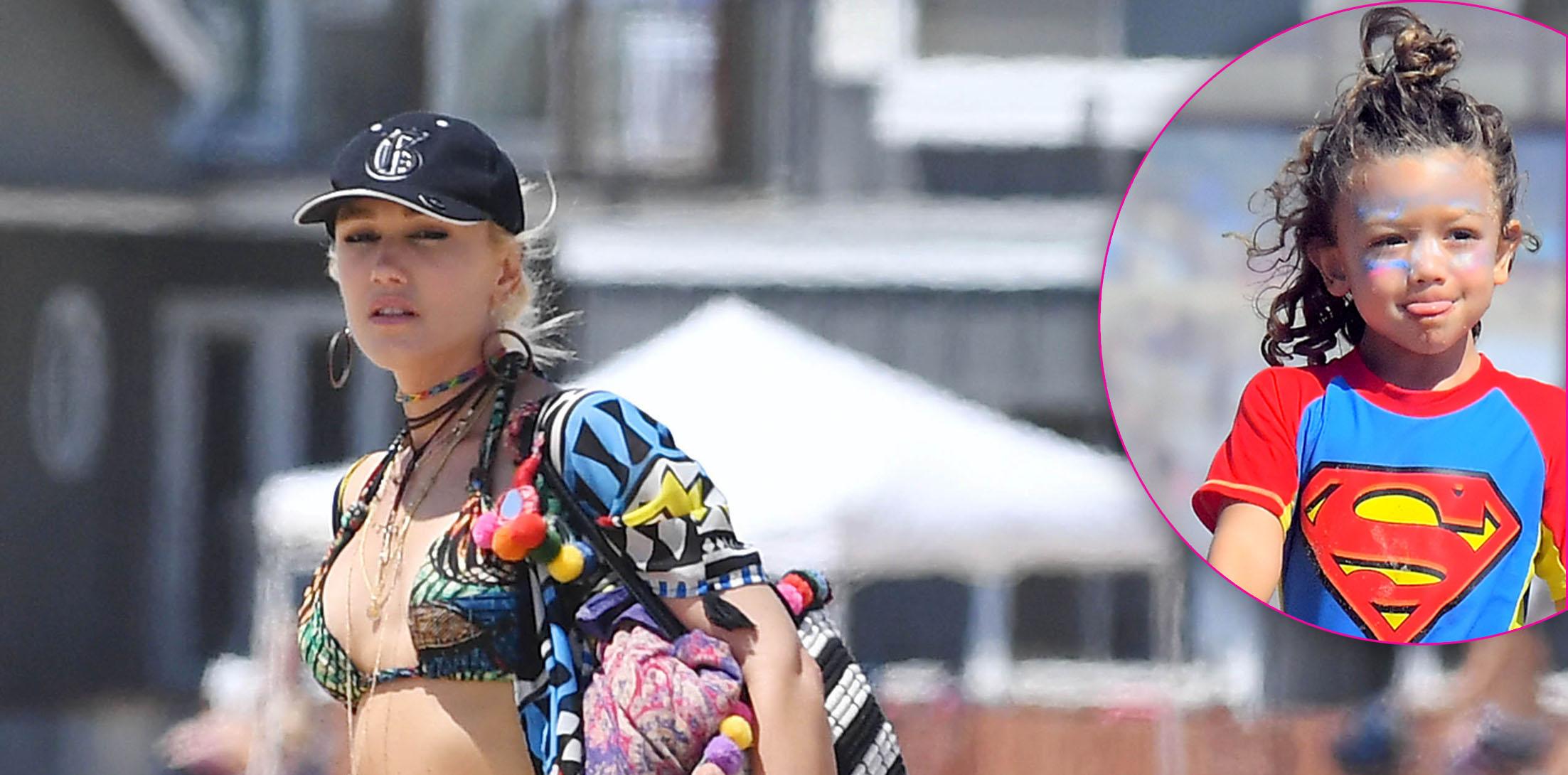 EXCLUSIVE: Gwen Stefani shows off her ripped abs in a tiny bikini top at the beach