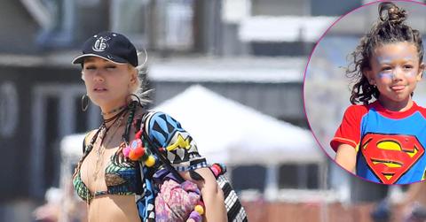 EXCLUSIVE: Gwen Stefani shows off her ripped abs in a tiny bikini top at the beach
