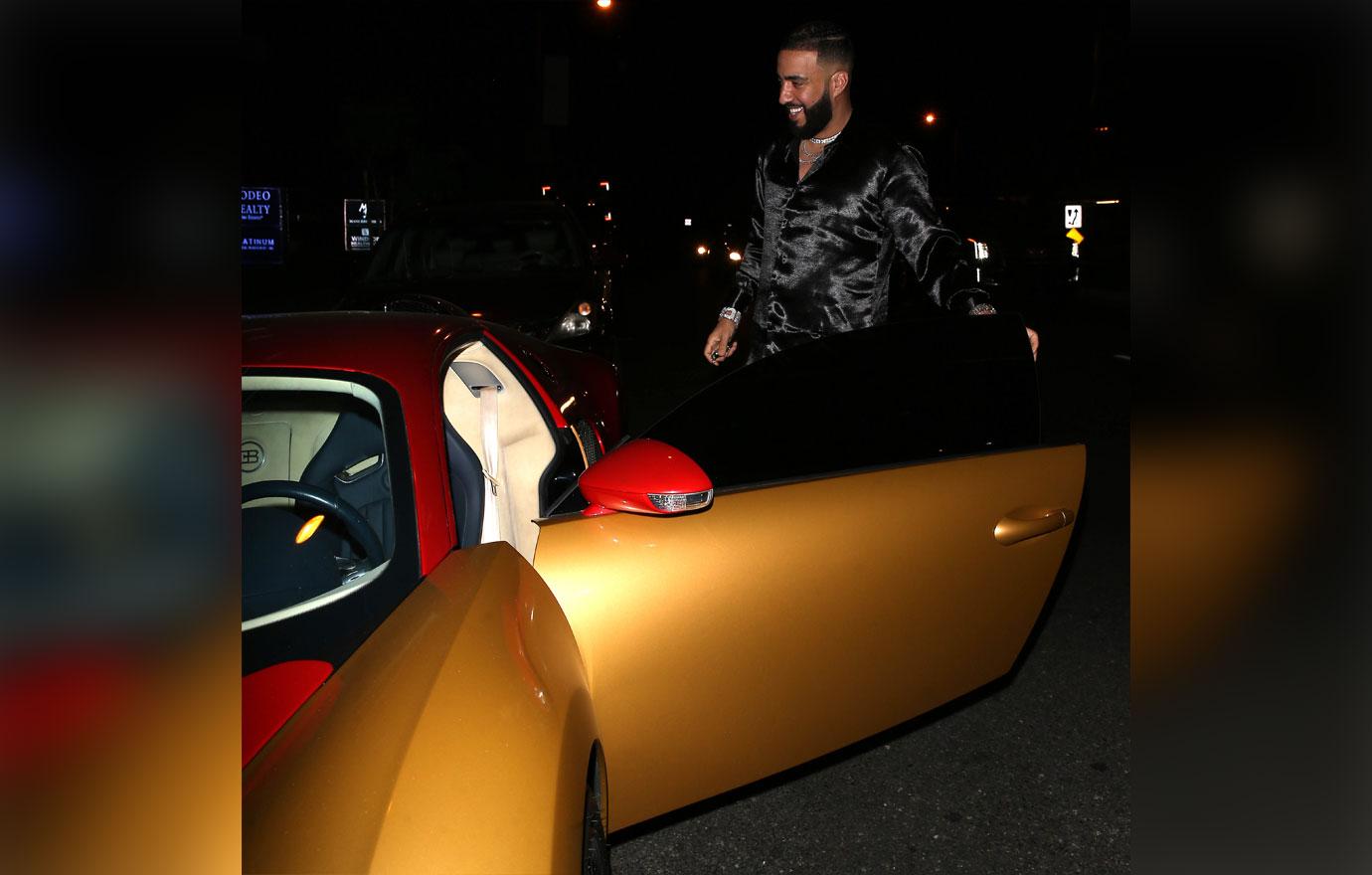 French Montana getting into gold and Red Bugatti