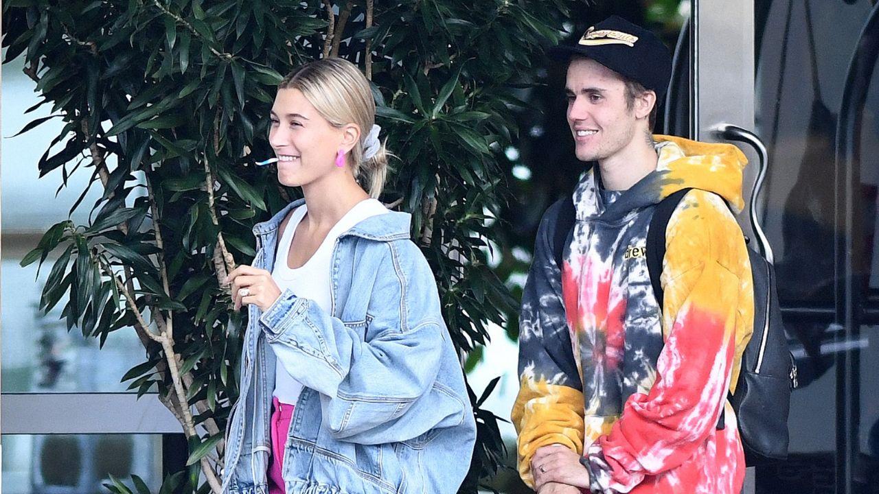 Image of Hailey and Justin Bieber opened up about their marriage and couldn't keep their hands off each other in the new photos.
