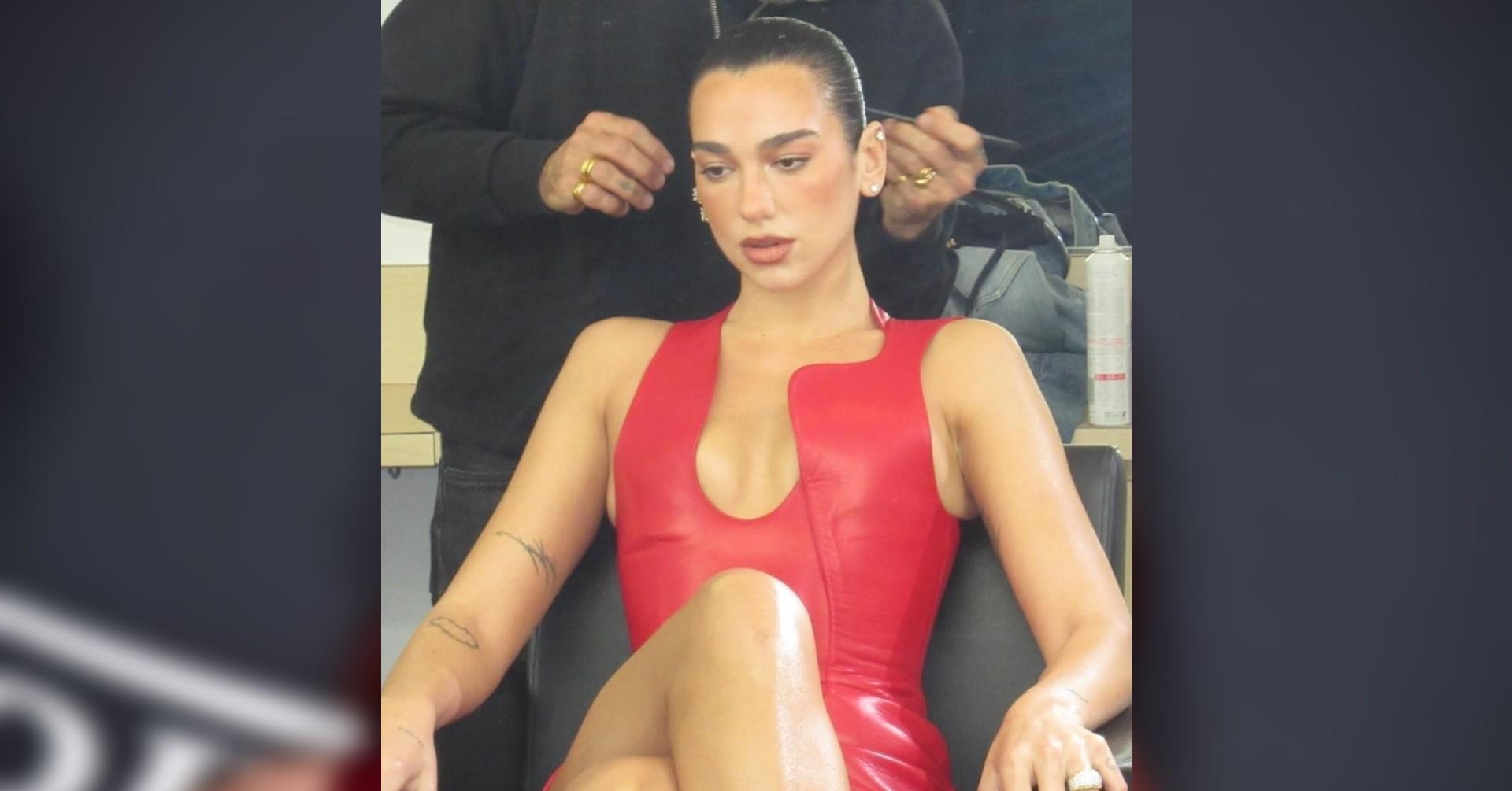 dua lipa stuns showing off assets red leather dress photos