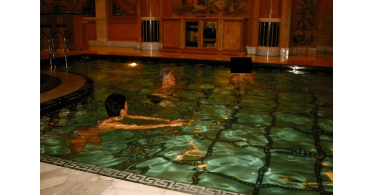 Photo of In another image, the former president went swimming with Ghislaine Maxwell.