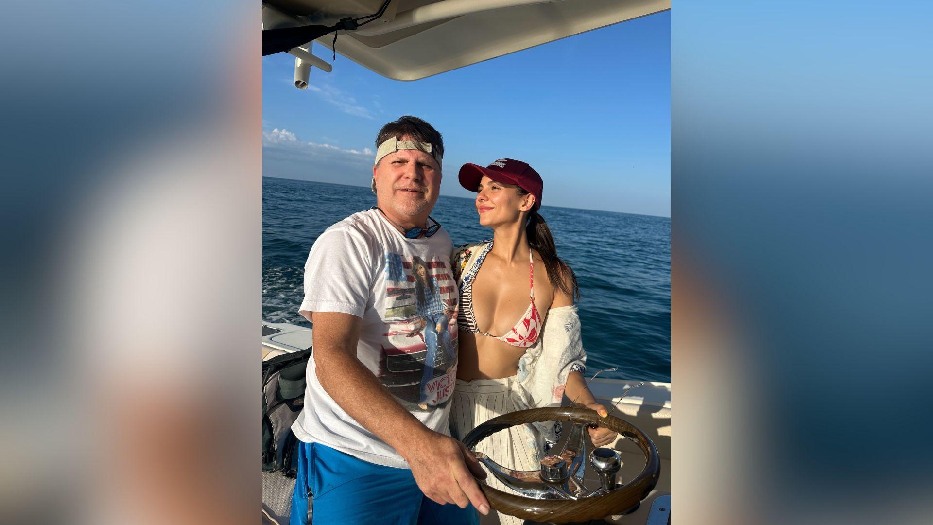 image of Victoria Justice included several family moments in her vacation photo dump, including pictures with her dad.