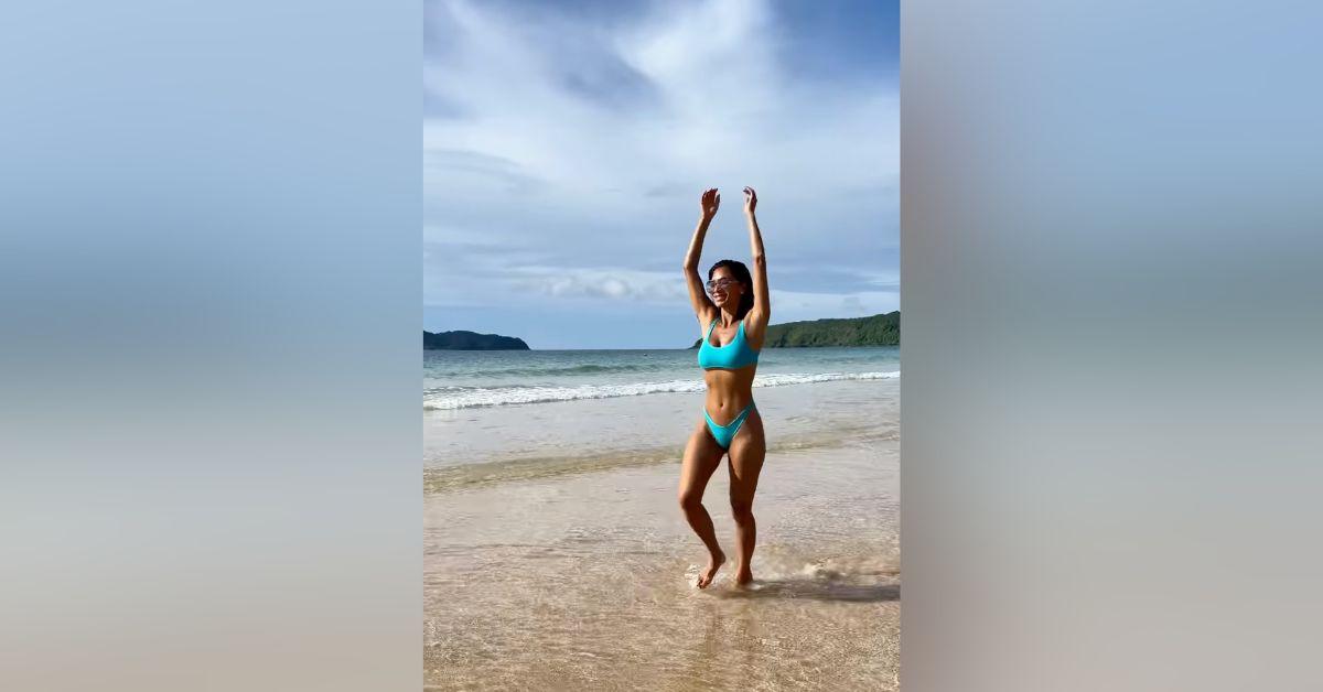 Image of Nicole Scherzinger took time off to swim on the beach.