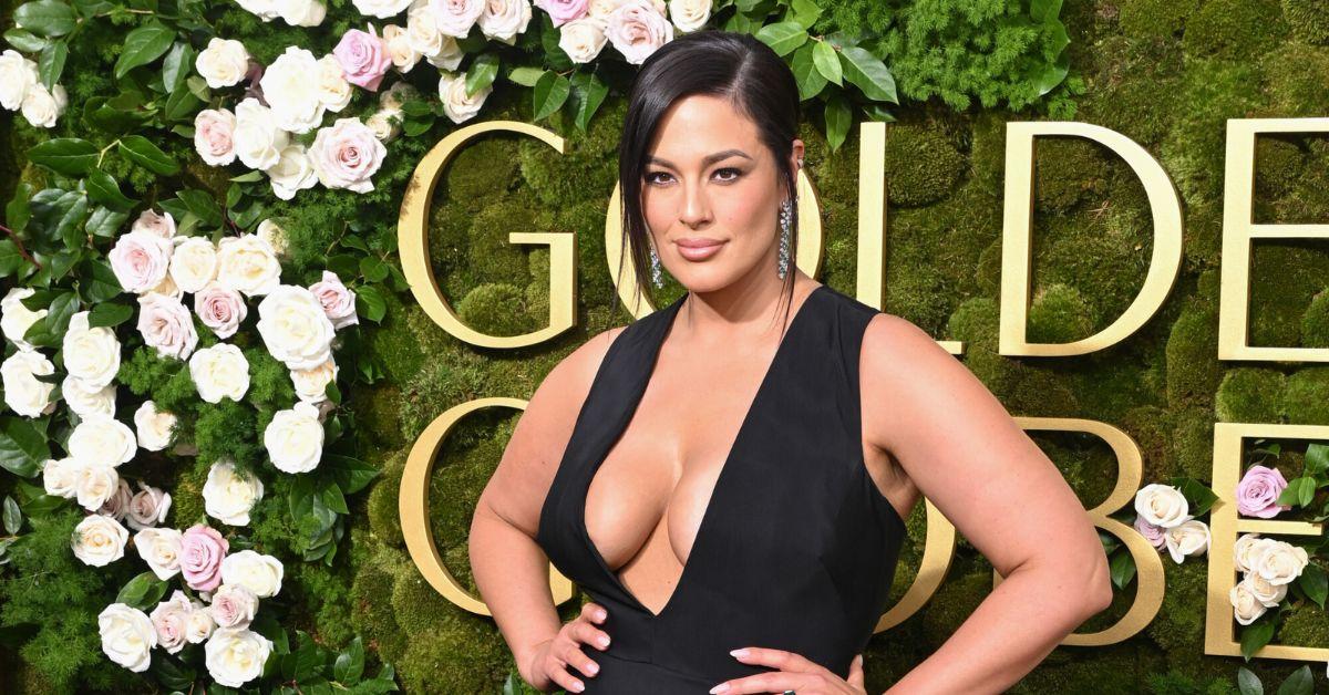 ashley graham spills out black dress  golden globes red carpet