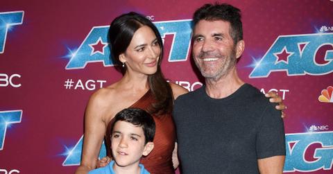 A photo of Simon Cowell, Lauren Silverman and their son, Eric.