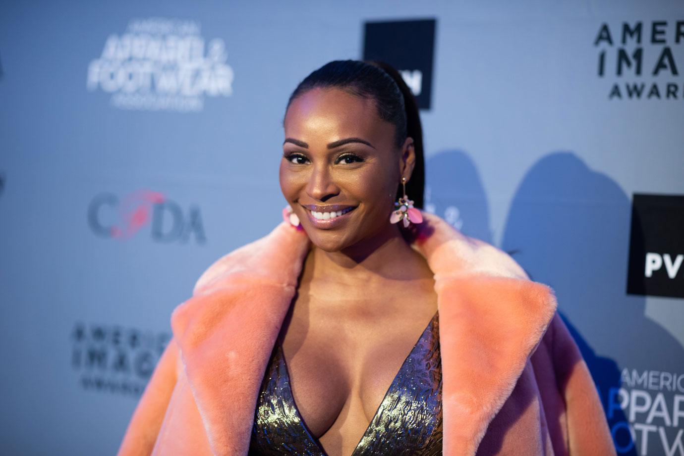 cynthia bailey in pink fur coat