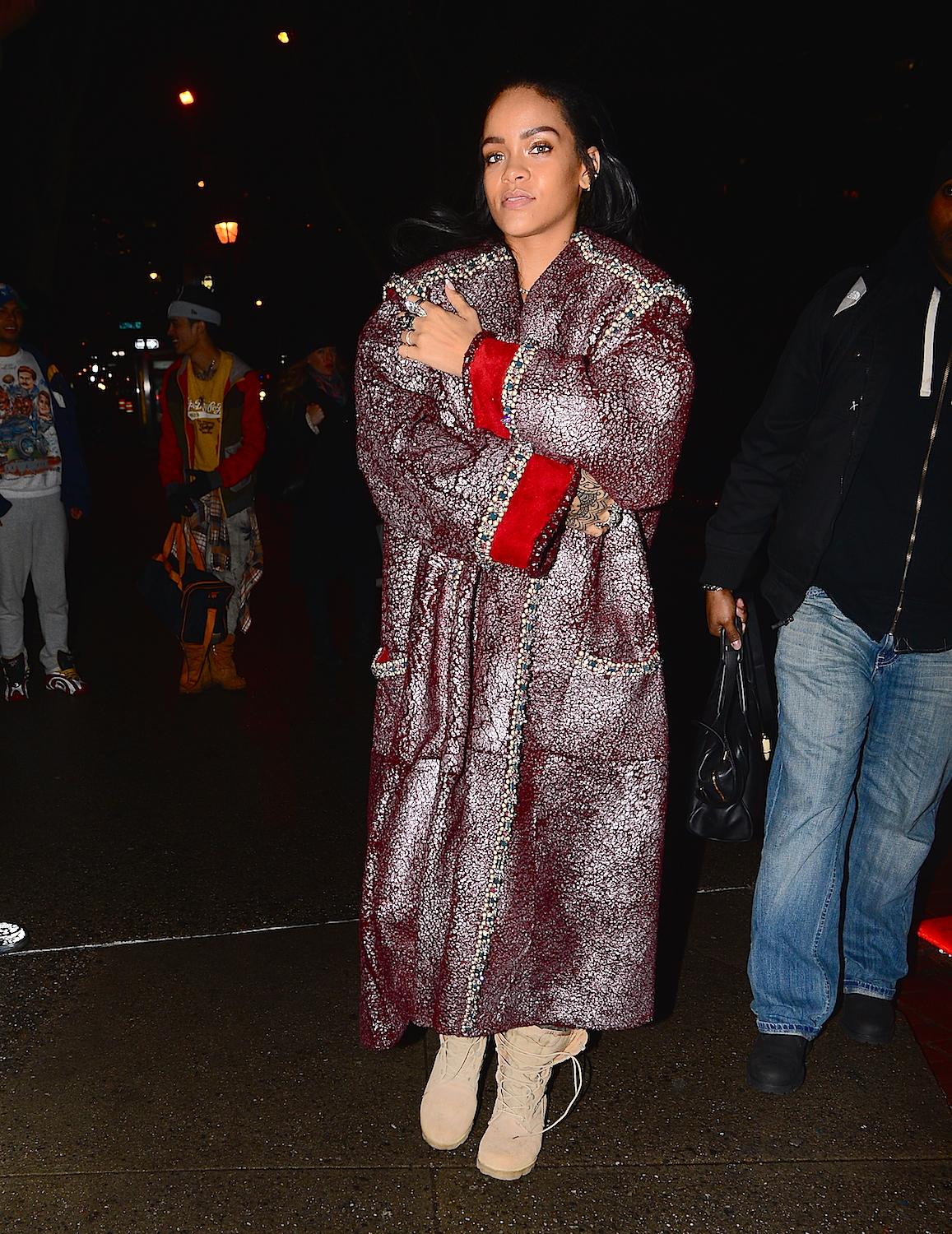 Rihanna and Kanye West wear matching boots as they leave a NYC studio