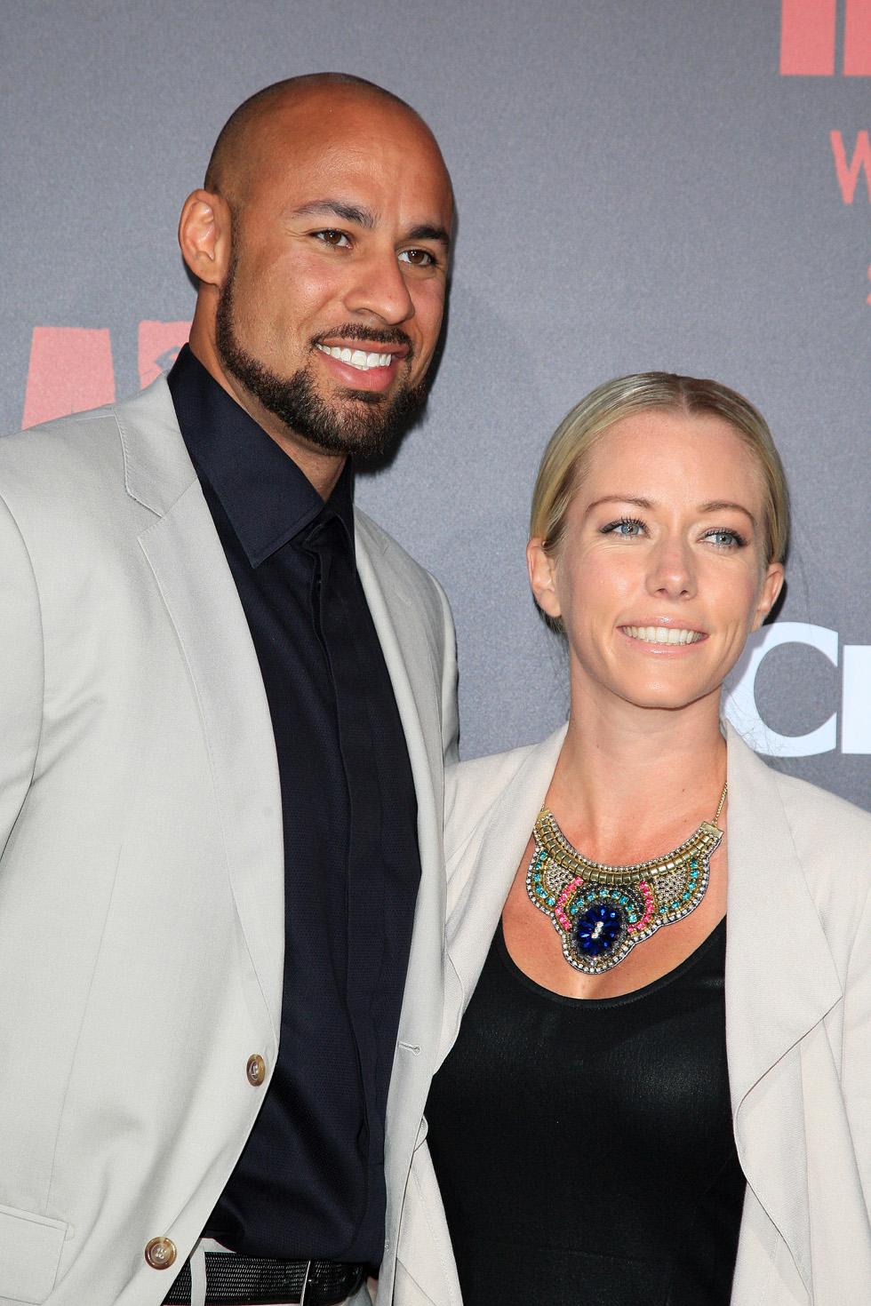 Hank Baskett and Kendra Wilkinson look happy at the World Premiere of &#8216;Dead Rising: Watchtower&#8217;