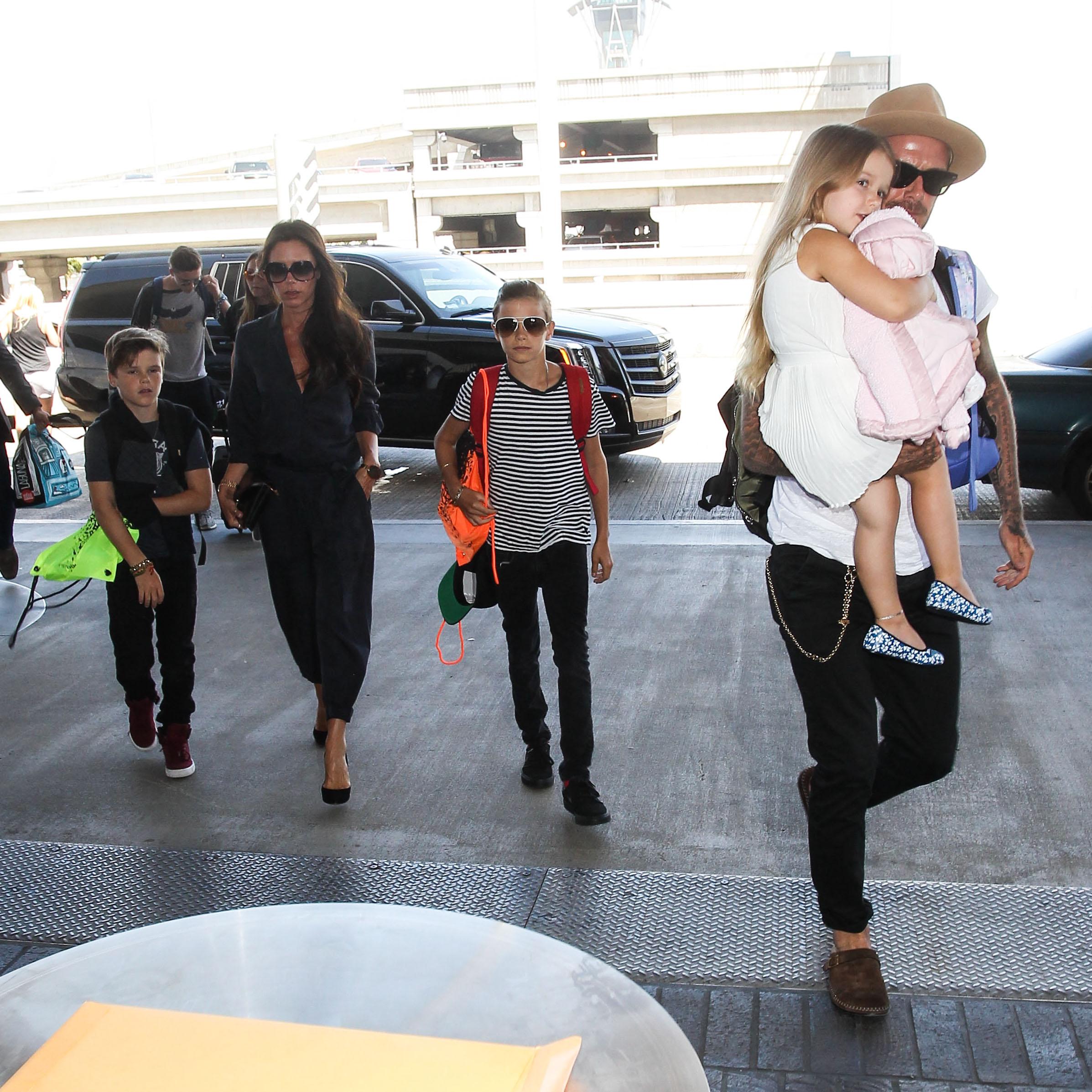 David Beckham, wife Victoria Beckham and children seen at LAX Airport