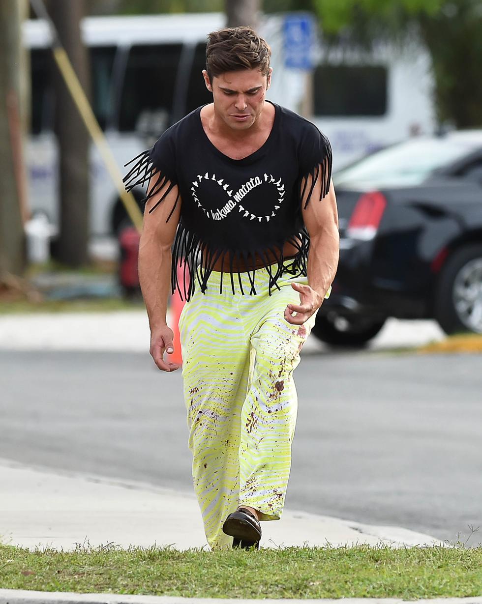 Zac Efron Shows Off His Abs In a Fringed Crop Top On Set Of Dirty Grandpa
