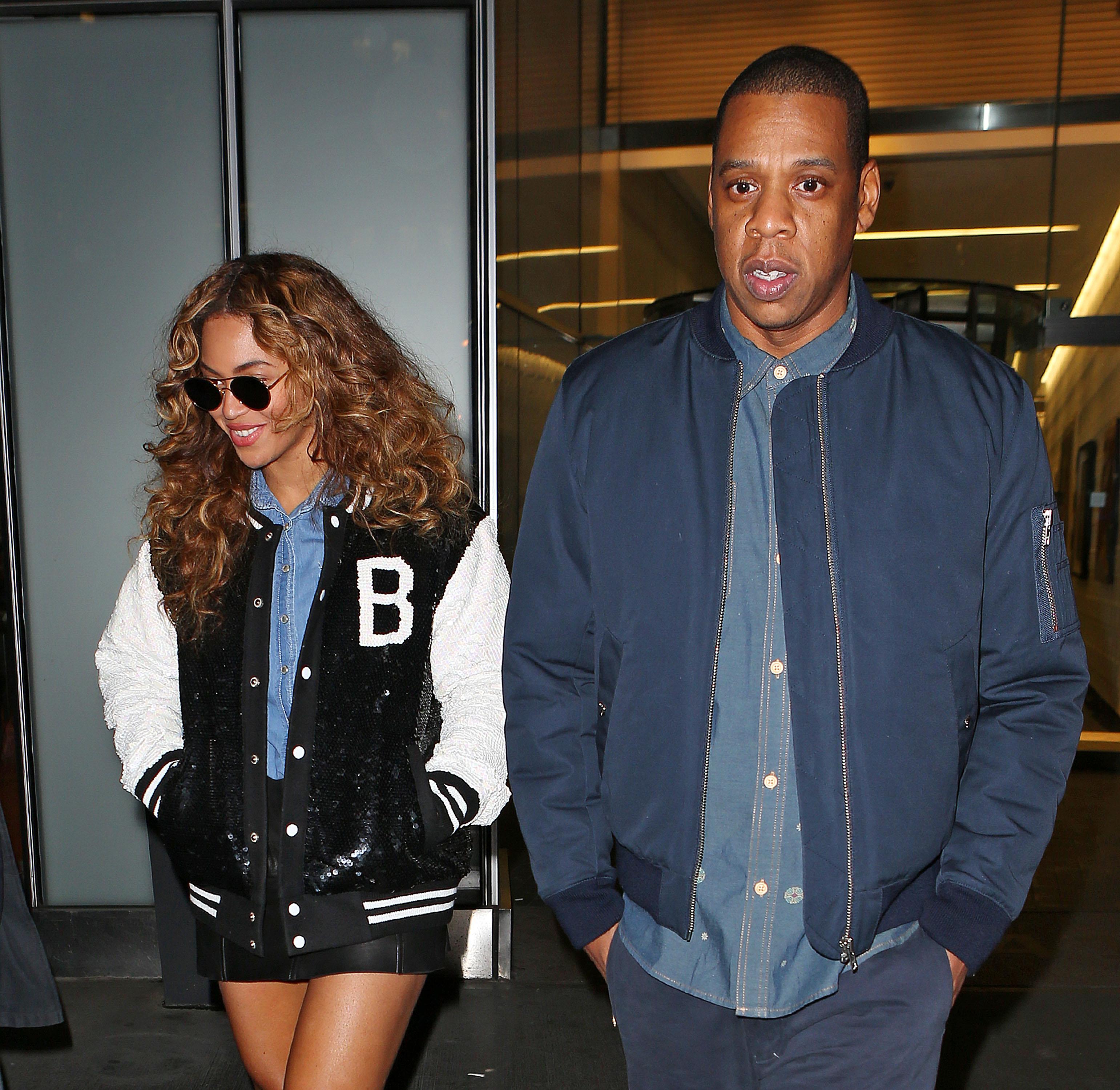 Beyonce and Jay Z depart their office together in NYC