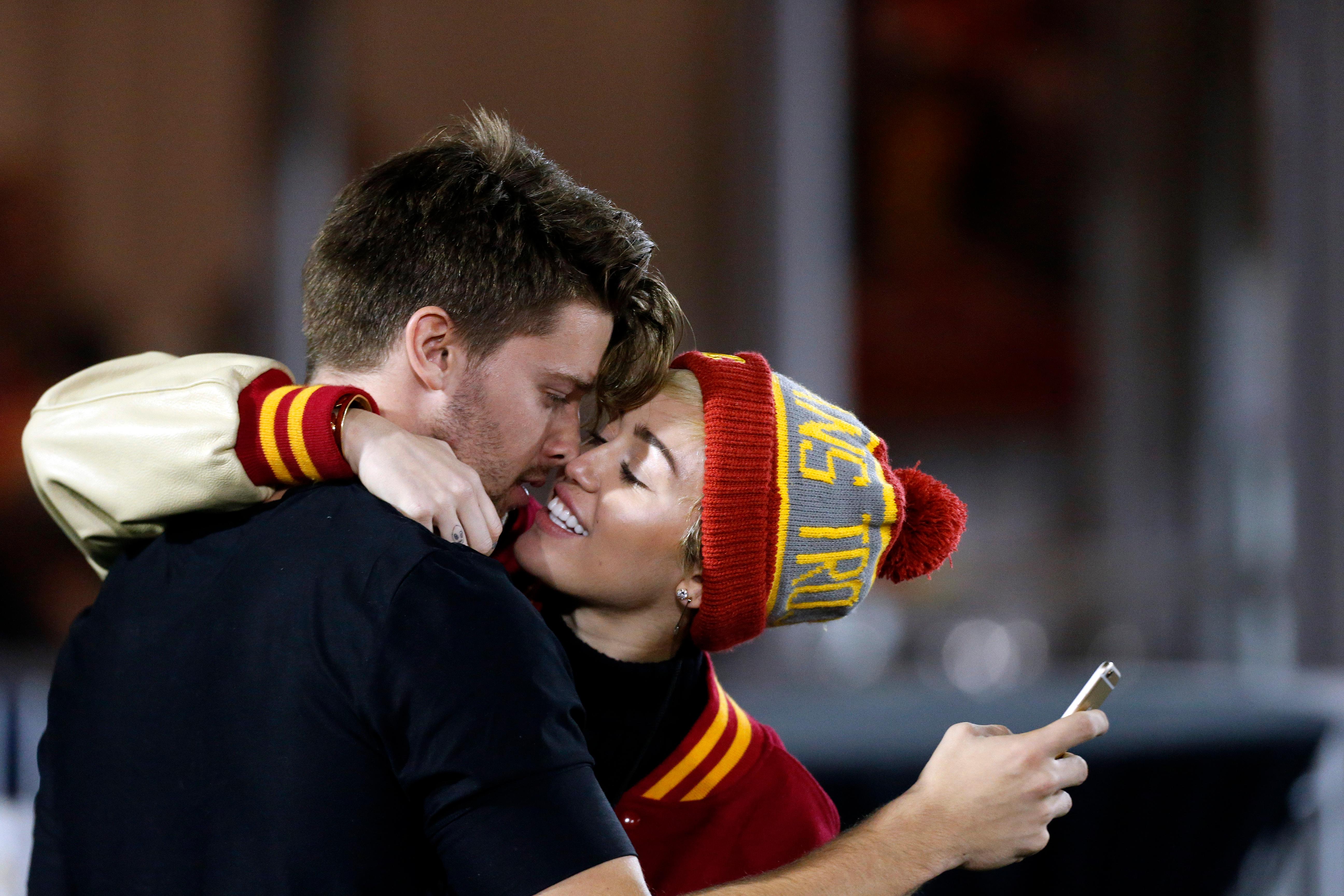 Patrick Schwarzenegger and Miley Cyrus sighting at USC football game