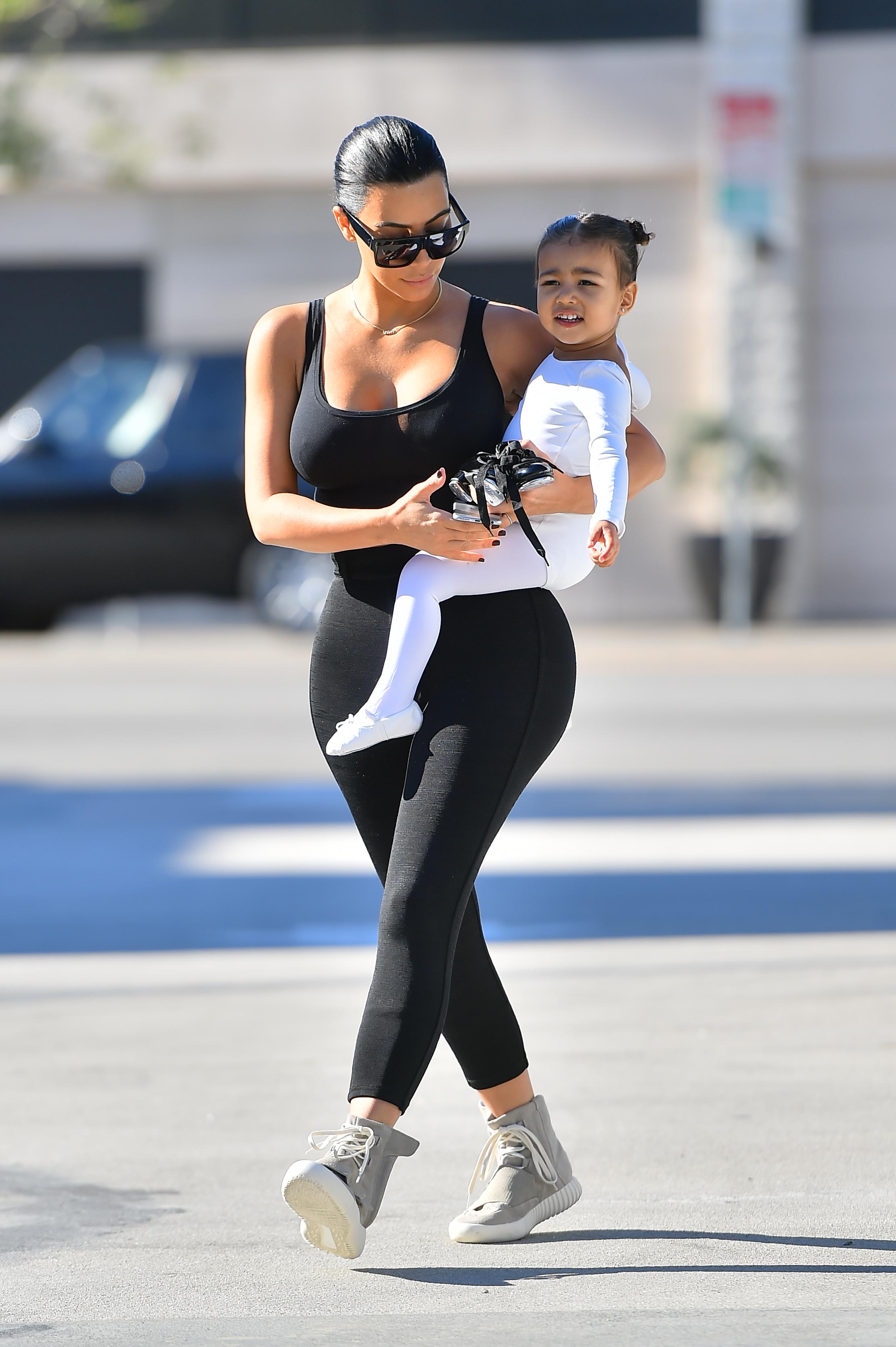 Kim Kardashian is back to black hair as she takes her little ballerina to a dance class