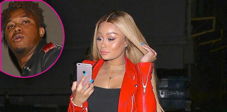 *EXCLUSIVE* Blac Chyna uses her phone to block her face after stepping out with a Mystery Male