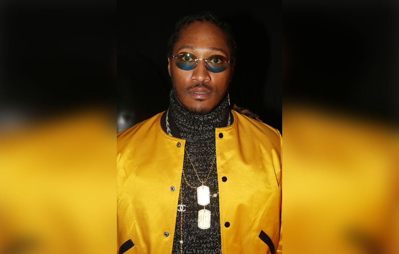 Rapper Future in yellow jacket and sunglasses