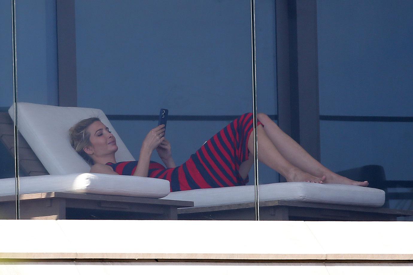 ivanka trump red and black striped dress lunch with son balcony miami