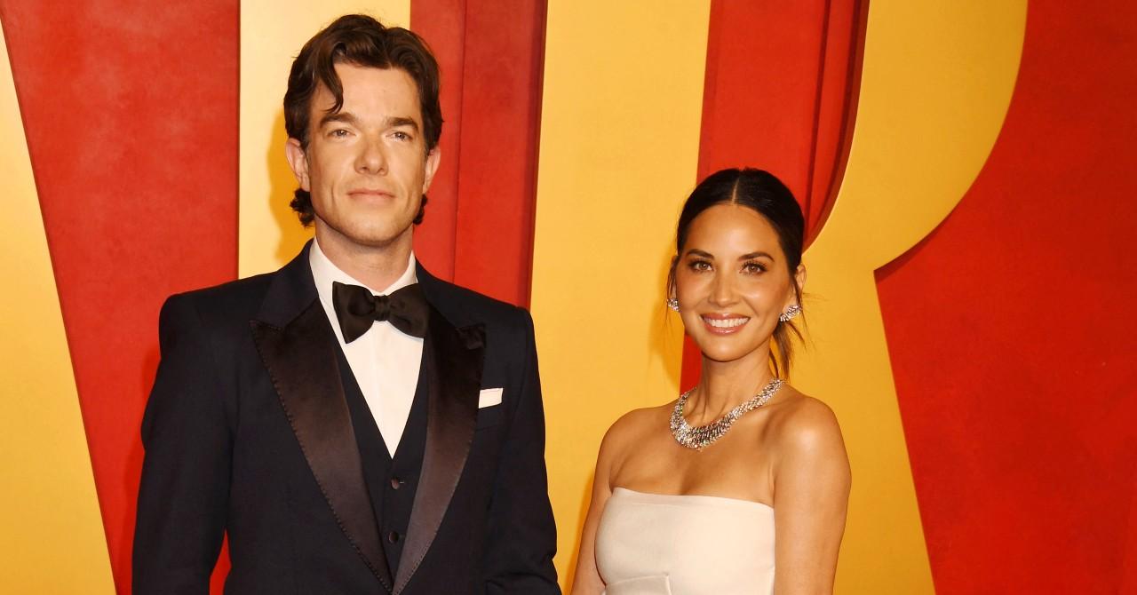 Photo of Olivia Munn and John Mulaney. 