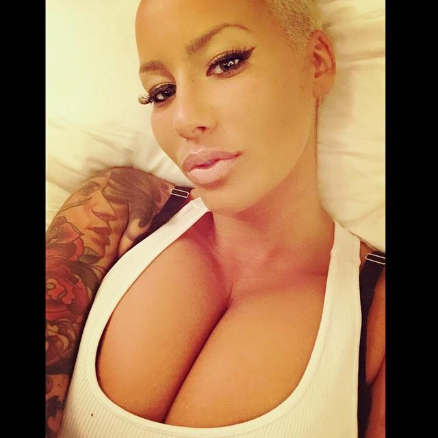 Amber Rose Flaunts Her Cleavage In Racy Selfie After Spending Time