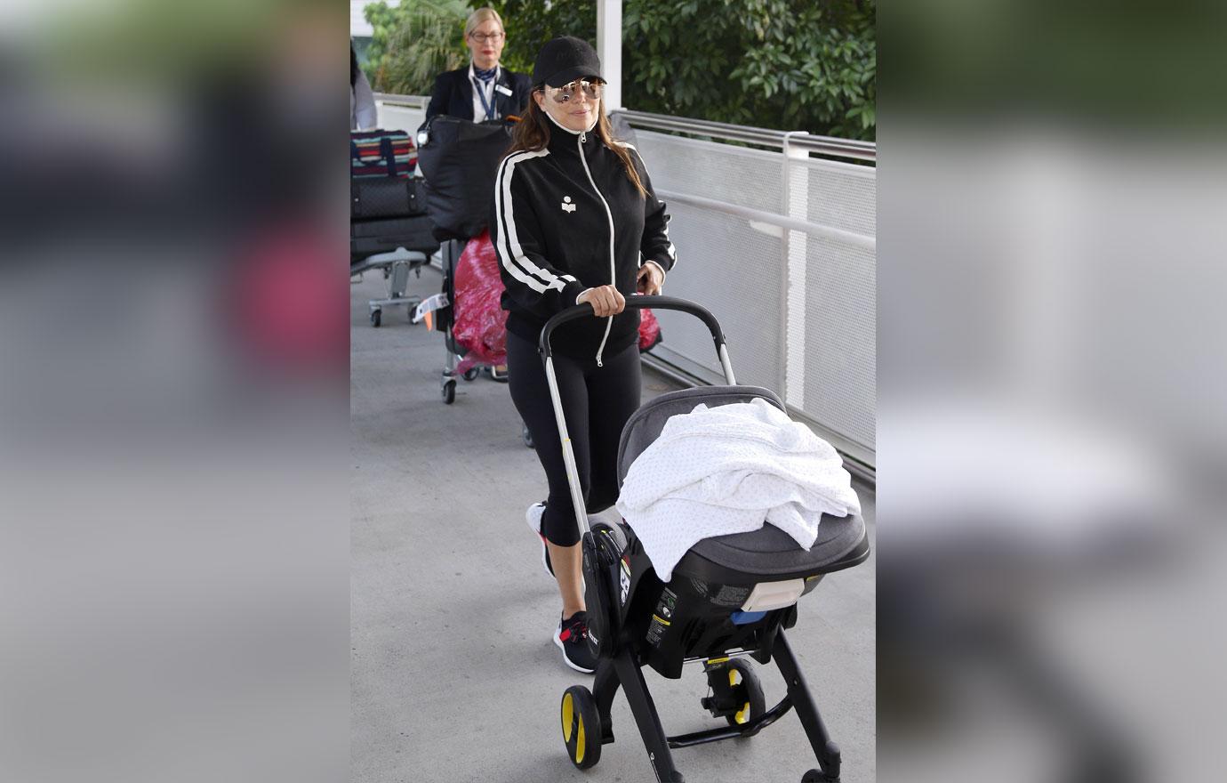 EXCLUSIVE: Eva Longoria arrives back in Australia with baby Santiago