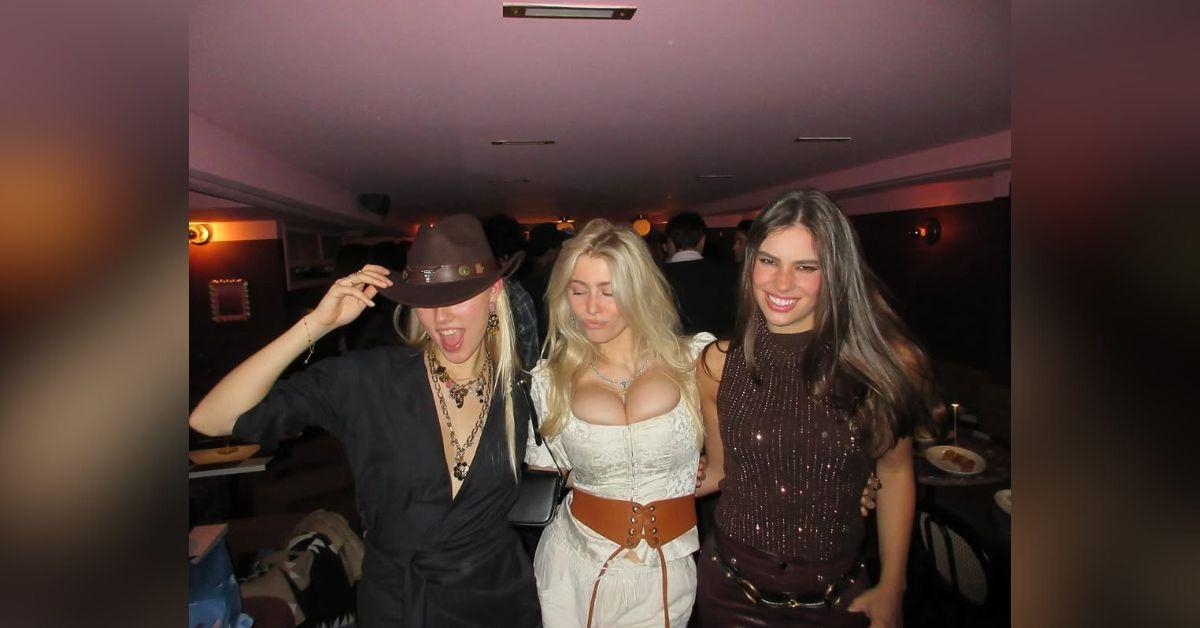 image of The model completed the outfit with jewelry and glam makeup.