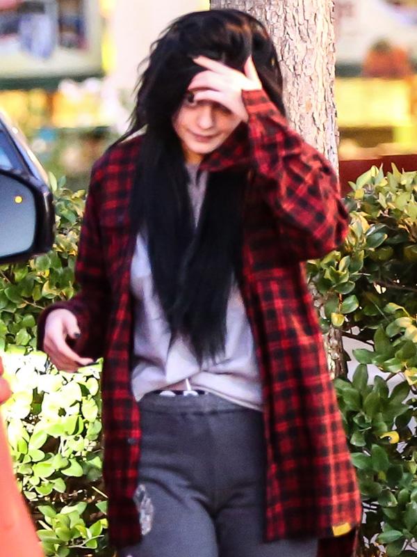 *EXCLUSIVE* Kylie Jenner looks disheveled as she borrows Tyga&#8217;s SUV and clothes