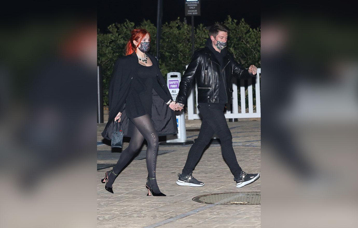 bella thorne and fiance benjamin mascolo walk hand in hand nobu malibu