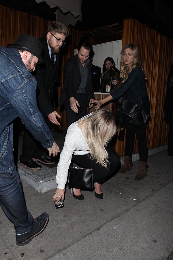 Hilary Duff taking a stumble while leaving The Nice Guy in West Hollywood