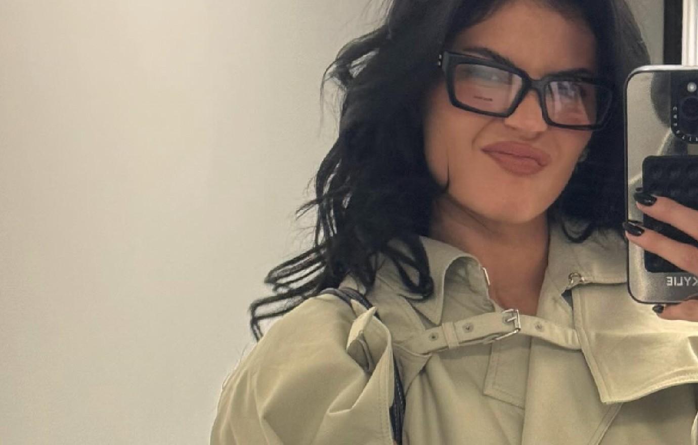 kylie jenner fans gush nerdy girl look glasses trench coat photos