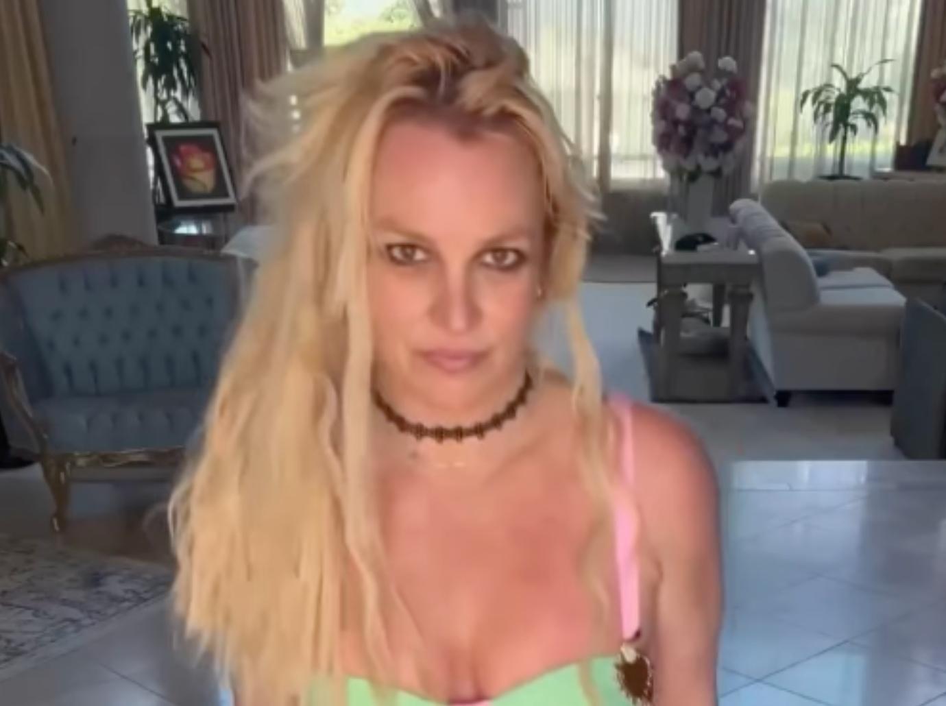 britney spears dancing skimpy neon bikini broken bone foot video