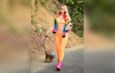 pregnant selling sunsets christine quinn goes on an even stroll with her dogs