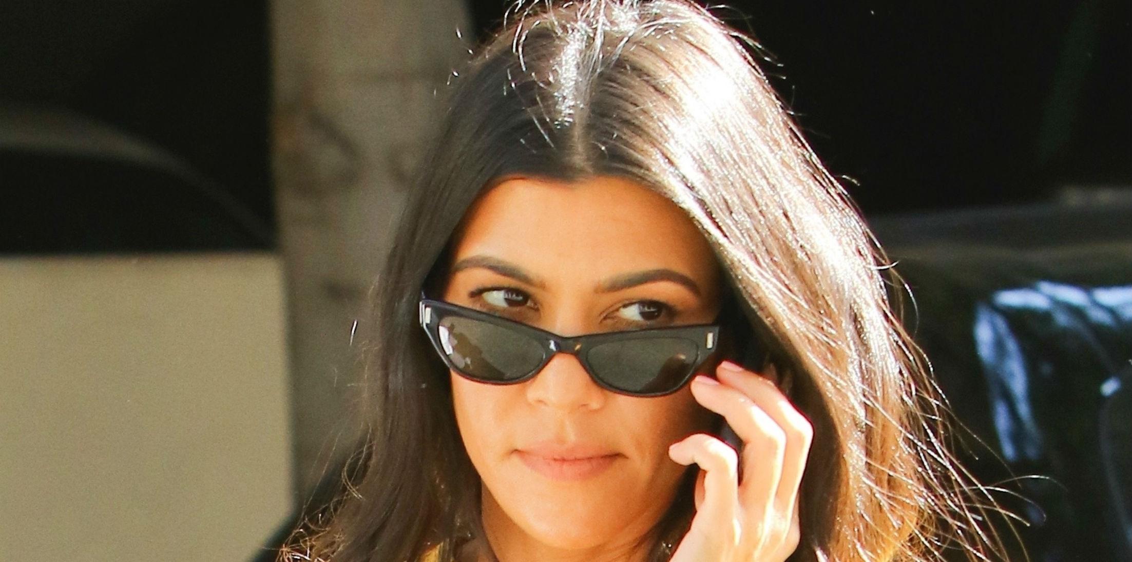 Kourtney Kardashian Wears Yellow Charge It 2 Da Game T Shirt Photos hero