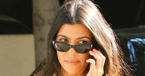 Kourtney Kardashian Wears Yellow Charge It 2 Da Game T Shirt Photos hero