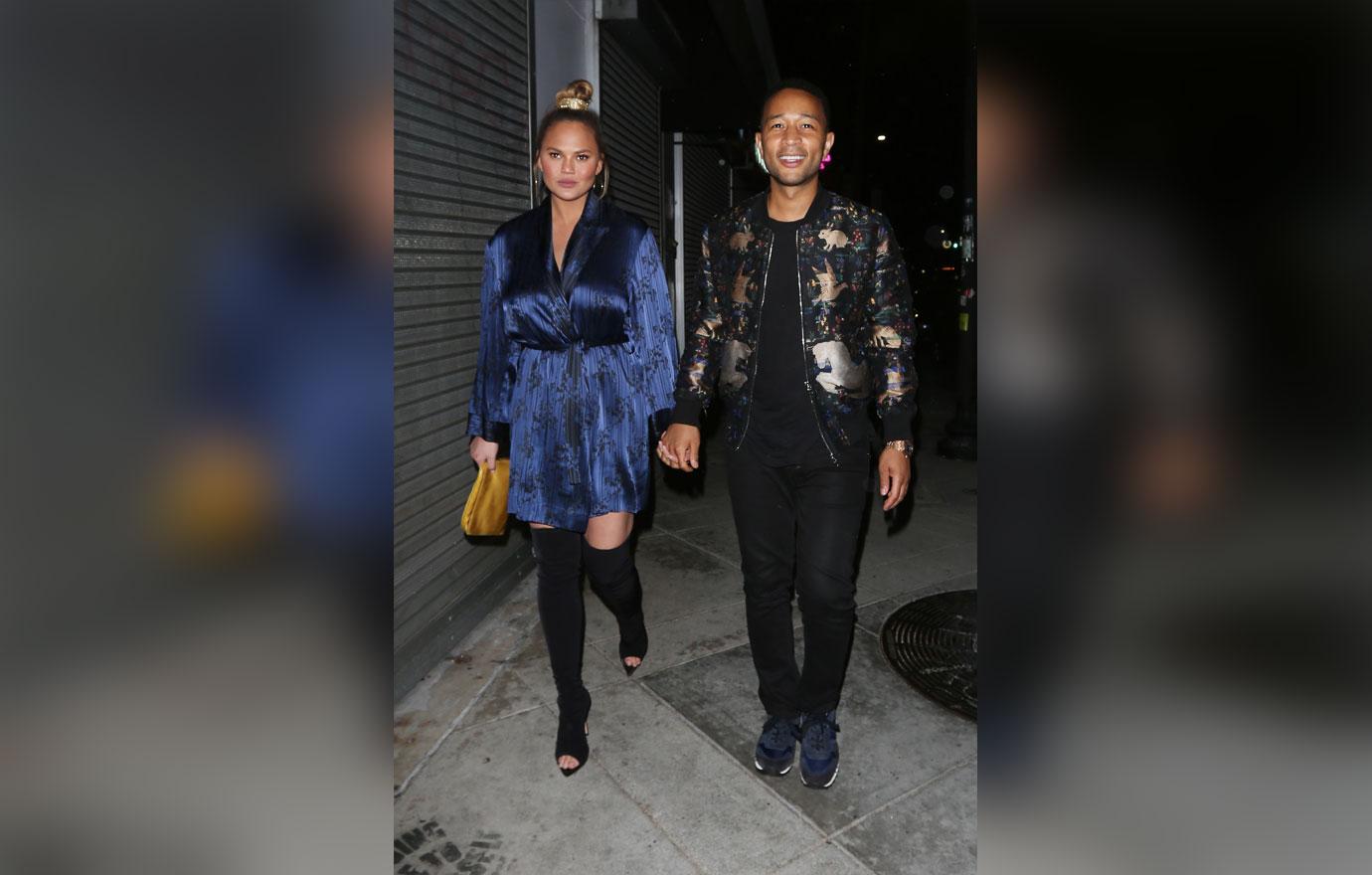 Chrissy Teigen and John Legend walk hand in hand as they exit Jon &amp; Vinny&#8217;s restaurant after dining with friends