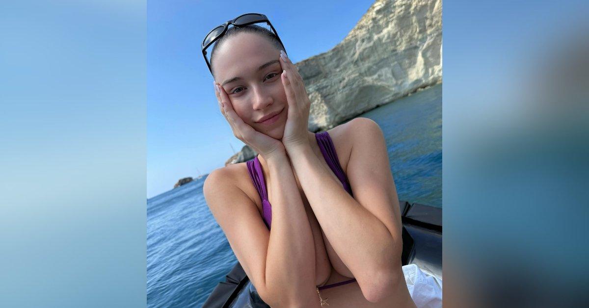 Photo of the brunette beauty took the snaps while on vacation in Greece.