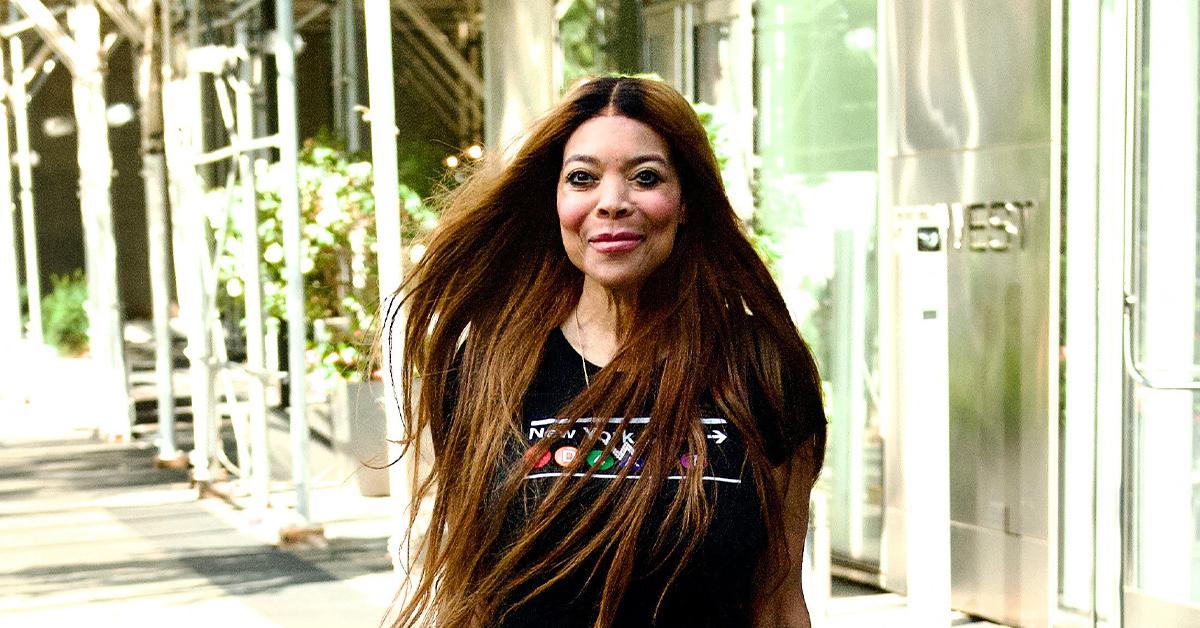 Wendy Williams Clutches Wig & Mystery Man During Night Out