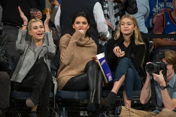 Kendall Jenner sits court side during NY Knicks game at Madison Square Garden with with Hailey Baldwin and Gigi Hadid